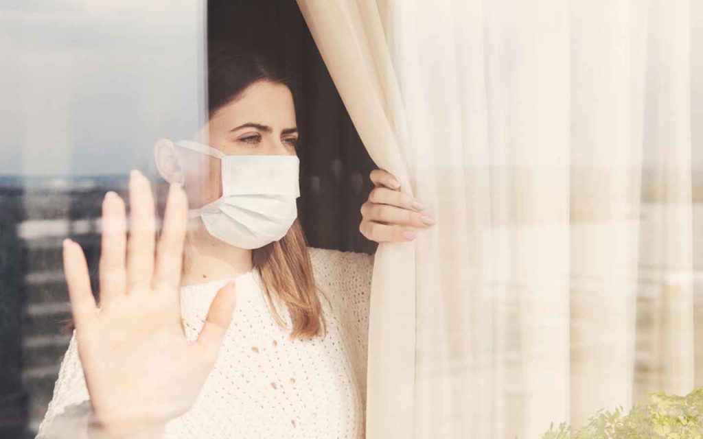 woman-in-quarantine-looking-out-window-1024x640.jpg